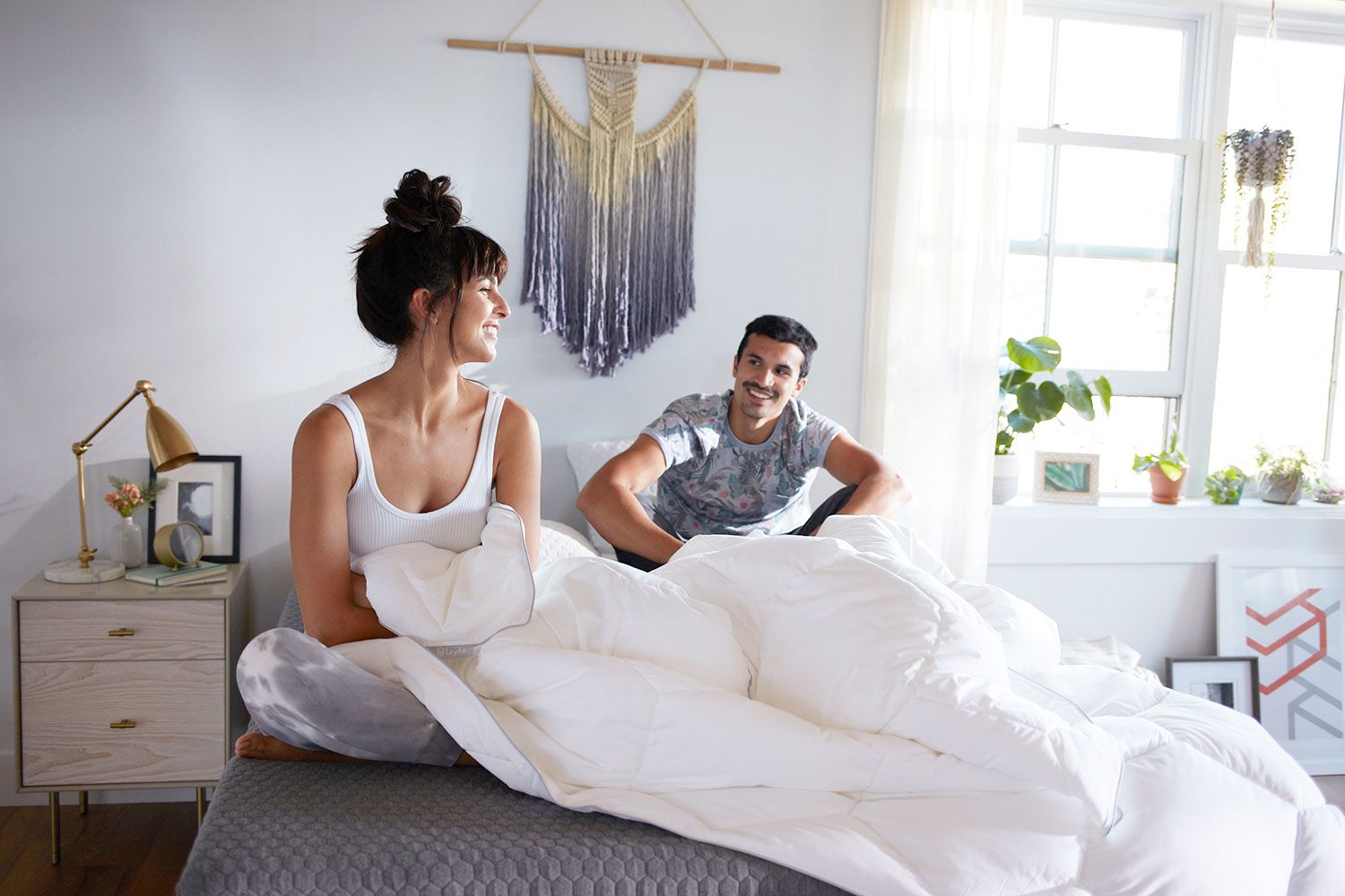 Couple laying on kapok pillows