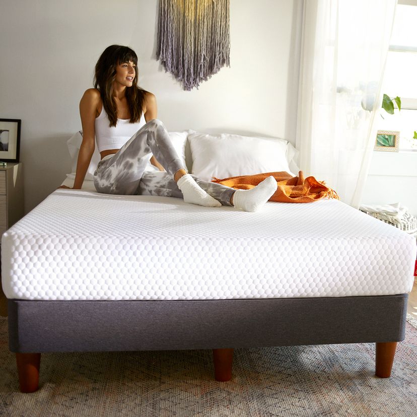 Girl sit and enjoy her precious time on Layla Essential Mattress