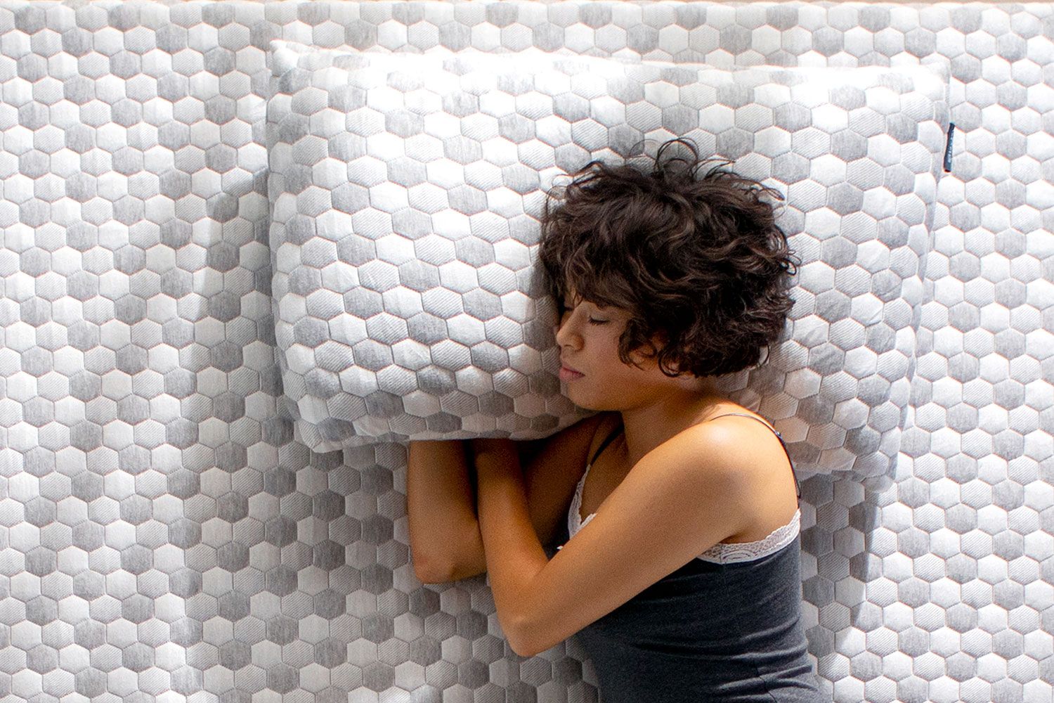 Woman laying on kapok pillow