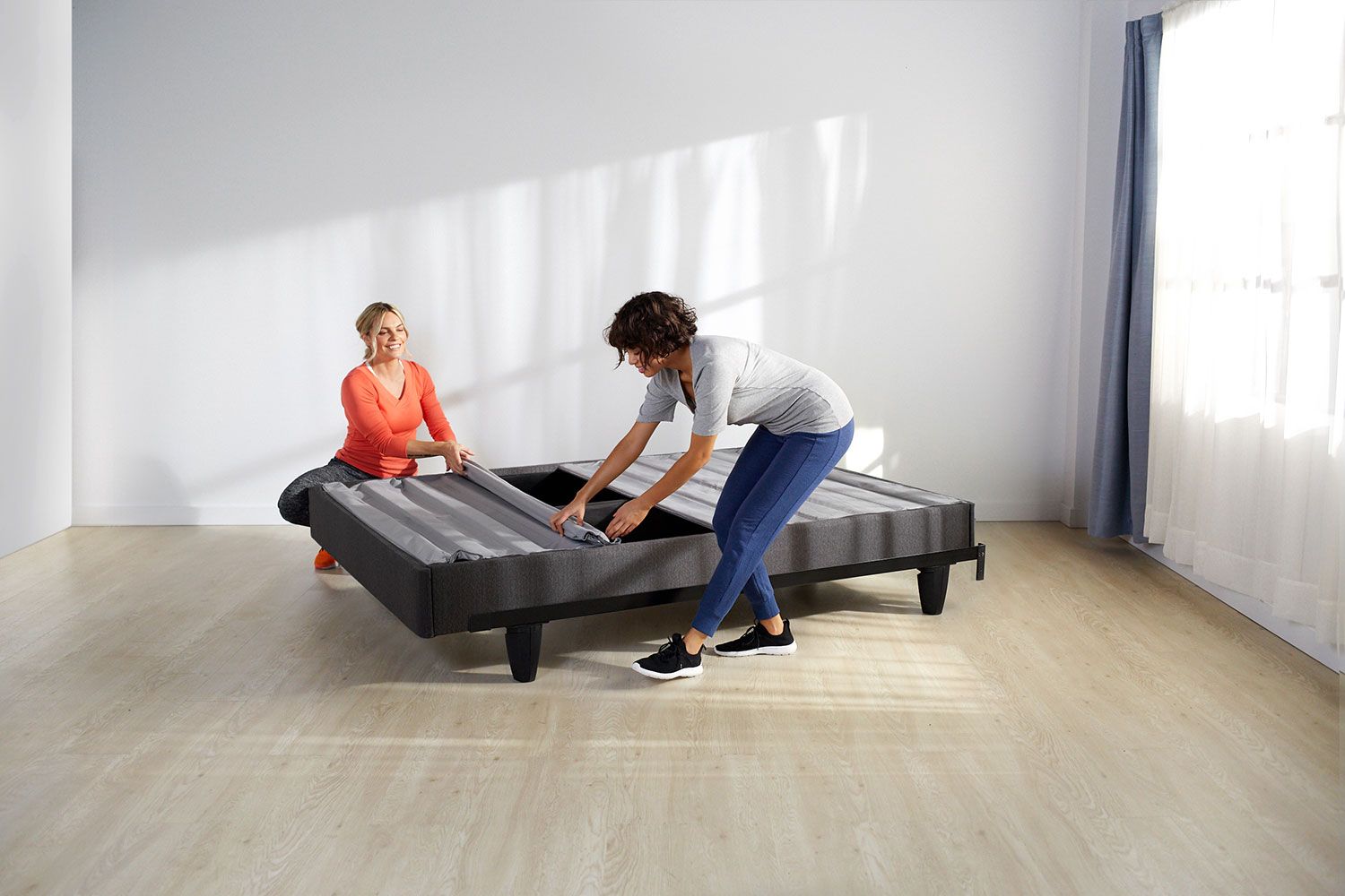 Woman laying on mattress