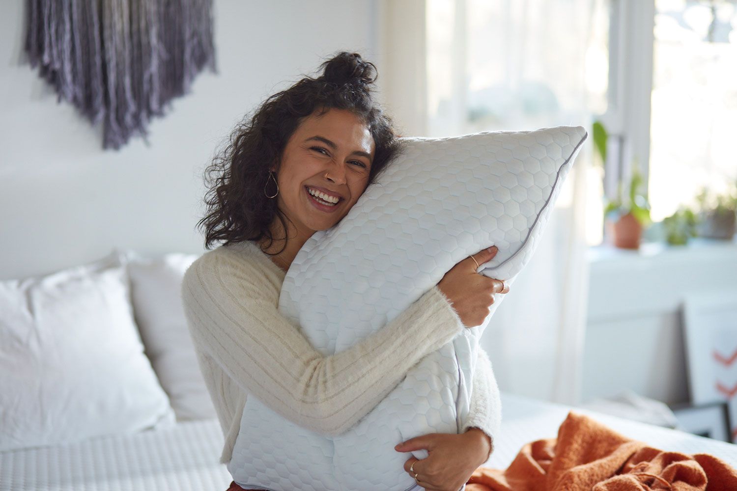 Woman laying on memory foam pillow