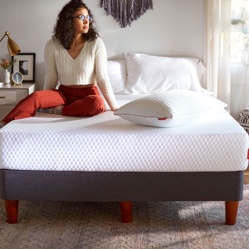 woman with shredded memory foam pillow