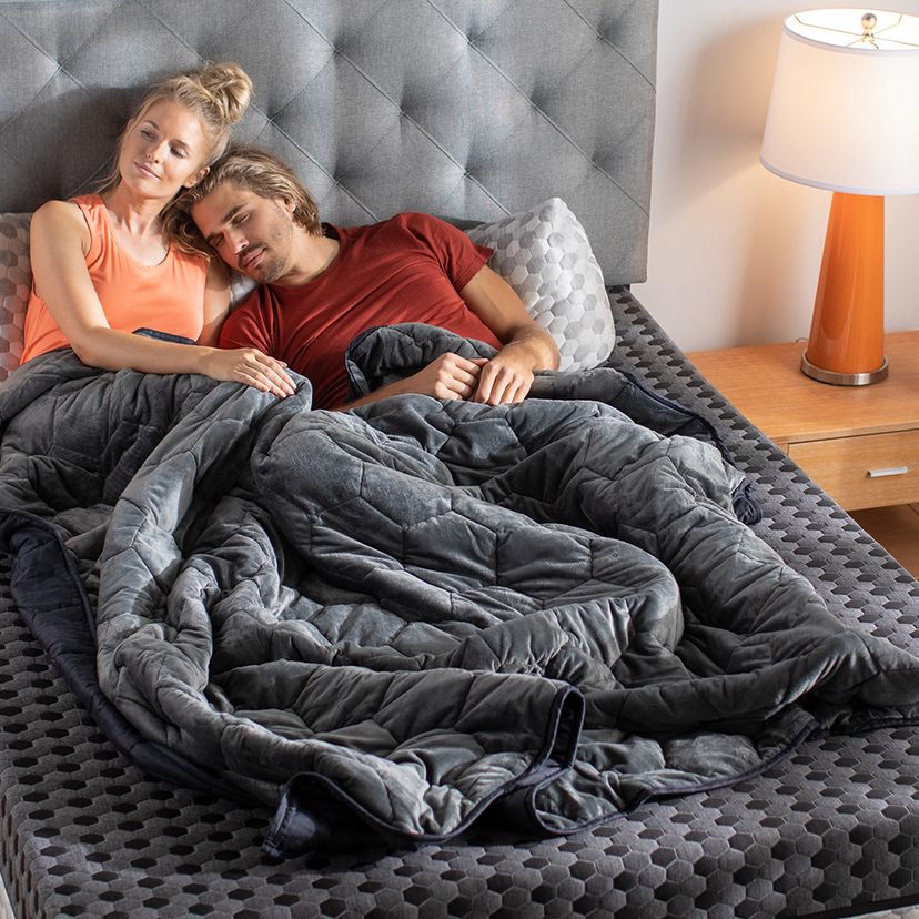 Couple with weighted blanket