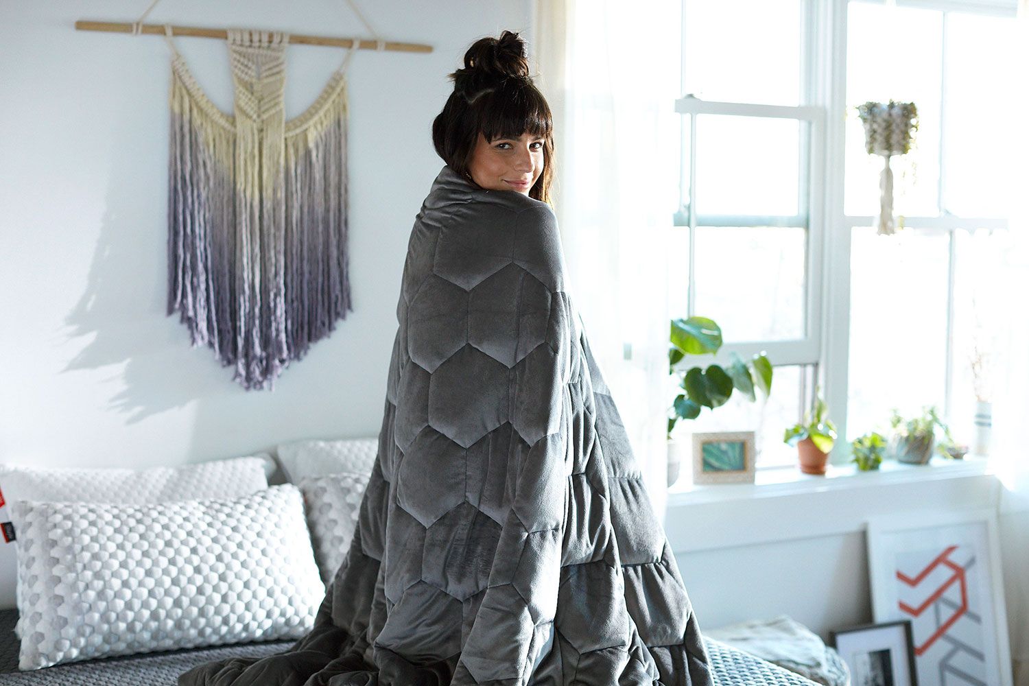 Woman laying on bamboo sheets
